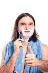 Happy man shaving