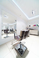 chairs and mirrors in hairdressing