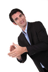 Businessman clapping