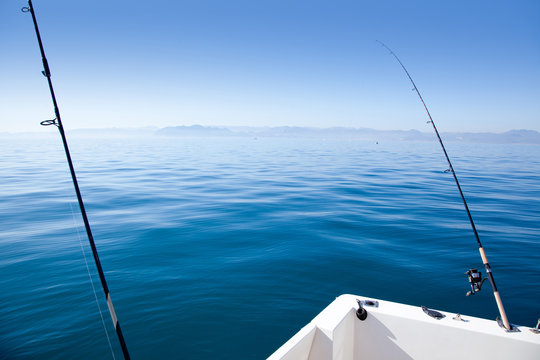 boat fishing rod in mediterranean blue sea