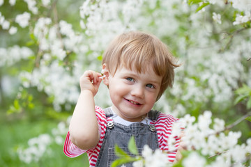 baby girl in spring  garden