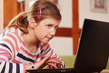 teenage girl at the laptop