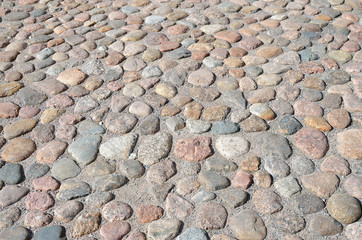Old road paved with the cobblestones