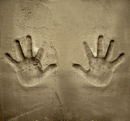 both hands print on cement mortar wall - obrazy, fototapety, plakaty