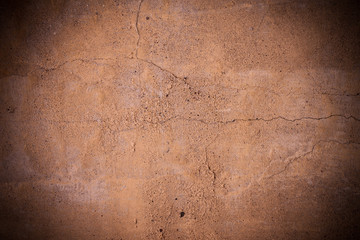 Cracked brown concrete wall