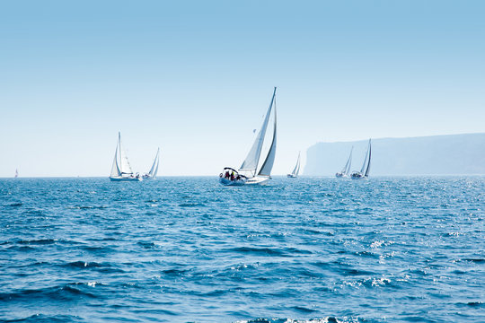 Fototapeta boats sail regatta with sailboats in mediterranean