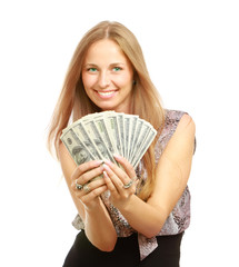 A young woman with dollars in her hands, isolated on white