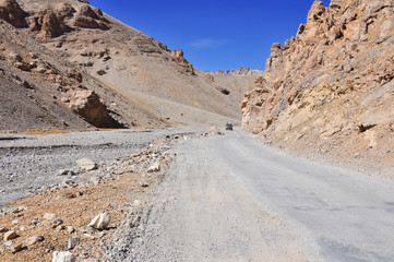 Long damaged asphalt road in Lahul, Himachal Pradesh, India 