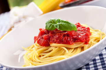 Spaghetti with Tomato Sauce on classical home table
