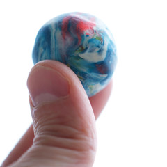 Fototapeta premium Planet in fingers isolated