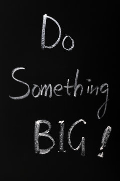 Chalk writing of Do something BIG