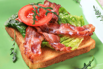 Toast with crispy bacon strips