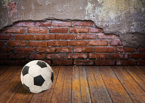 soccer ball in the old brick room © jannoon028