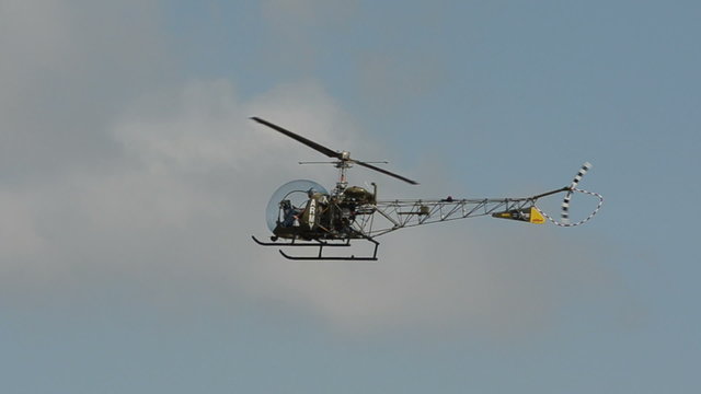 Old helicopter in flight