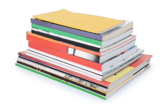 pile of books and magazines with blank cover