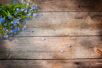 flowers on wooden background