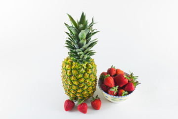 Fototapeta na wymiar Pineapple and Strawberries