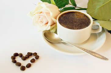 cup of coffee and rose
