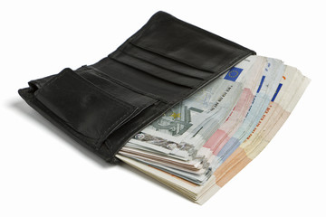 many banknotes in wallet