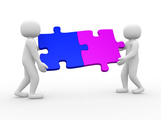 Two person matching puzzle pieces