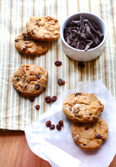Biscuits with chocolate drops, nuts and raisins, freshly baked