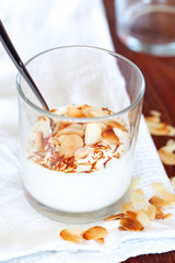 Goat yoghurt with saffron and toasted almonds in a glass