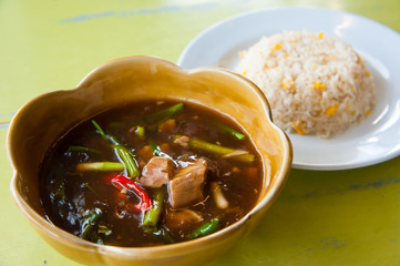 delicious hot fried rice with stream pork curry