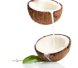 Coconut with coconut milk isolated on white