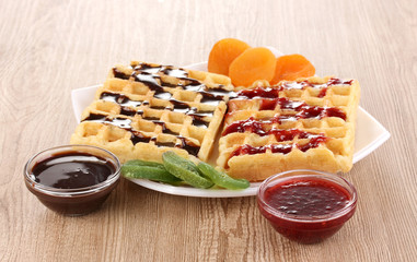 Sweet waffles with jam and chocolate