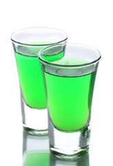 Two glasses of absinthe isolated on white