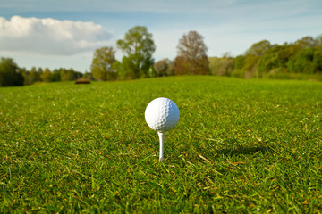 Golf ball on the beautiful golf course