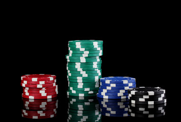 Casino chips isolated on black