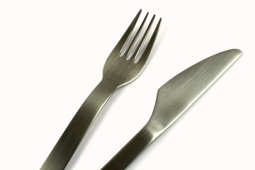Fork and knife on white background