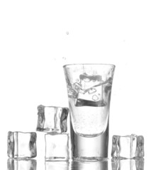 glass vodka and ice isolated on white