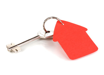 Key with house-shaped charm isolated on white