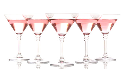 Red cocktail in martini glasses isolated on white
