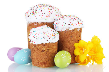 Beautiful Easter cakes, colorful eggs and flowers isolated