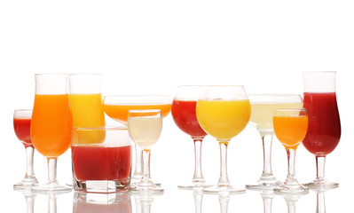 Tropical juices in glasses isolated on white