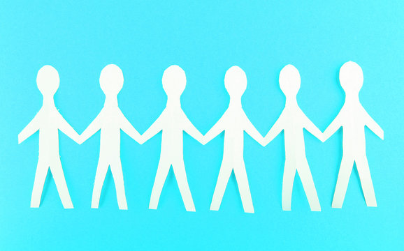 Paper people on blue background