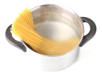 Cook the spagetti in the pan on white background close-up