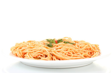 Italian spagetti cooked with tomato sauce in a white plate