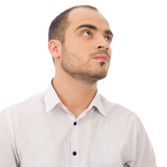 Fototapeta premium Thinking man isolated on white background. Closeup portrait of a