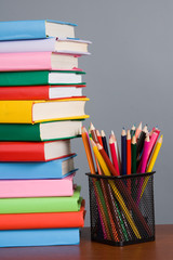 Fototapeta premium Stack of books and pencils