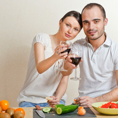 Young love couple cooking. Big copyspace