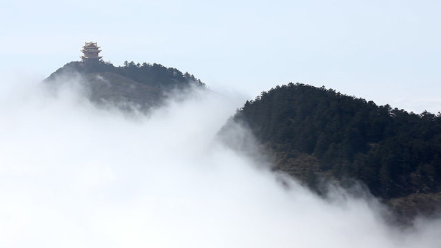 Beautiful chinese pagoda in hi cloudy mountains