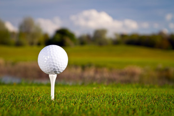 Golf ball on the beautiful golf course