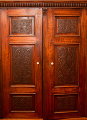 Old fashion wardrobe with carving