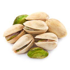 Pistachio nuts isolated on white background