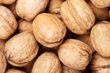 Brown walnuts textured background