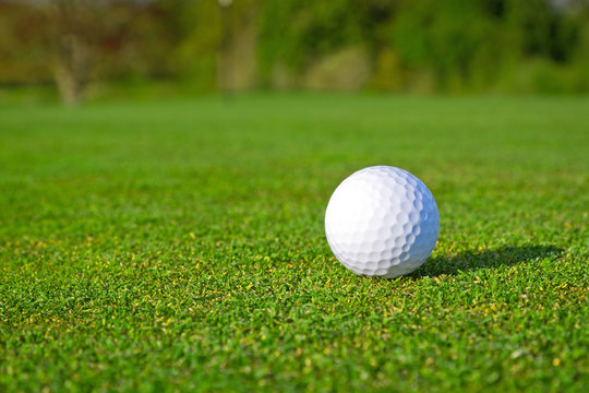 Golf ball on beautiful golf course